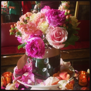 Yves Piaget Roses (the Mama's favorite) were accompanies by blush stock, blush hypericum berries, and soft pink Titanic Roses, and adorned with crystals. 